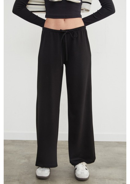 Beli Bağlamalı Bol Paça Pantolon