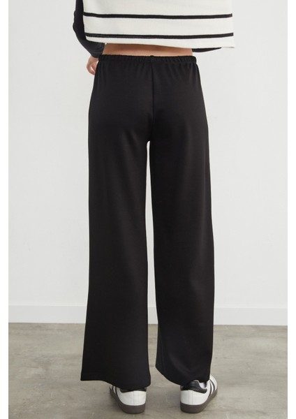 Beli Bağlamalı Bol Paça Pantolon