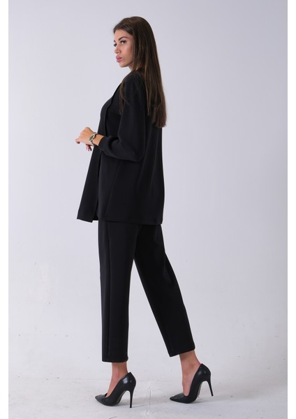 Siyah Bileği Lastikli Tunik Üzeri Detaylı Pantolonlu Takım 4577260.01 fırsatları