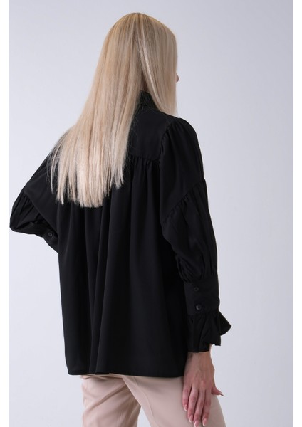 Siyah Göğüs ve Manşeti Büzgü Detaylı Bluz 3972060.01 indirimleri