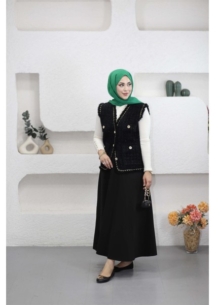 140363 Angora Sim ve Püskül Detaylı Yelek fırsatları