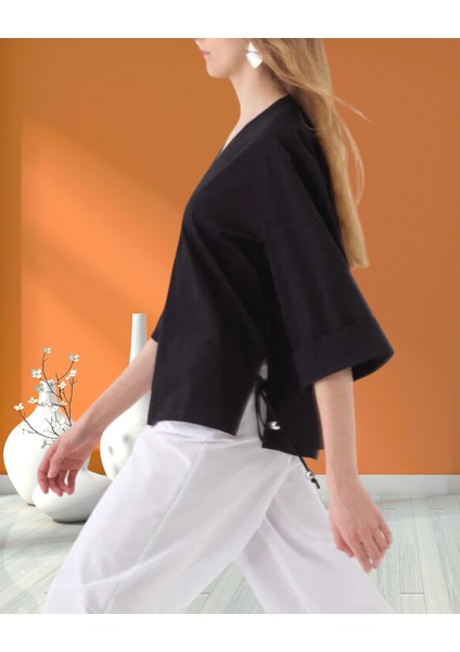 xint Kadın Kapri Kol V Yaka Yanı Yırtmaç ve Bağcık Detaylı Regular Fit Pamuklu Bluz fiyatları