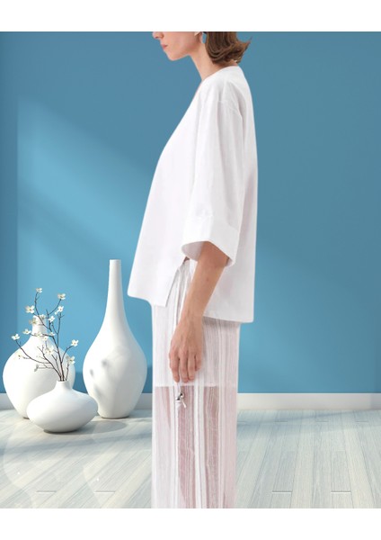 xint Kadın Kapri Kol V Yaka Yanı Yırtmaç ve Bağcık Detaylı Regular Fit Pamuklu Bluz fiyatları