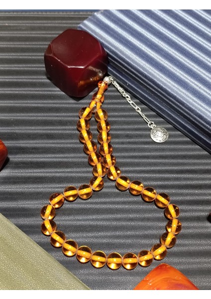 şeffaf Zarafet: Bal Rengi Sıkma Çubuk Kehribar Tesbih fiyatları