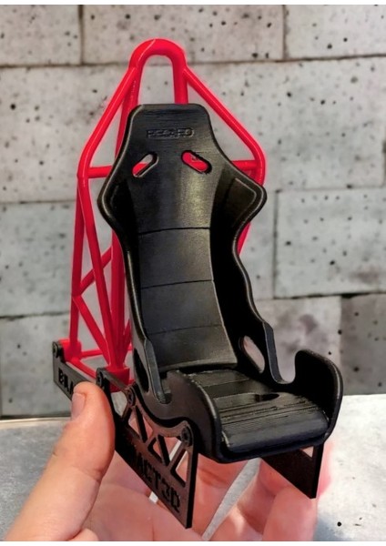 - 3D Baskı Yarış Koltuğu Şekilli Telefon Standı – Drift Simülasyon Tasarımlı Masaüstü Tutucu fiyatları