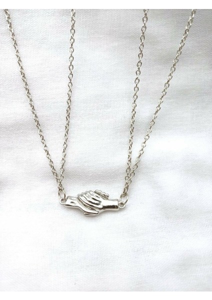 Gümüş Renk Mıknatıslı El Ele Tutuşan Sevgili Arkadaş Kolyesi fırsatları