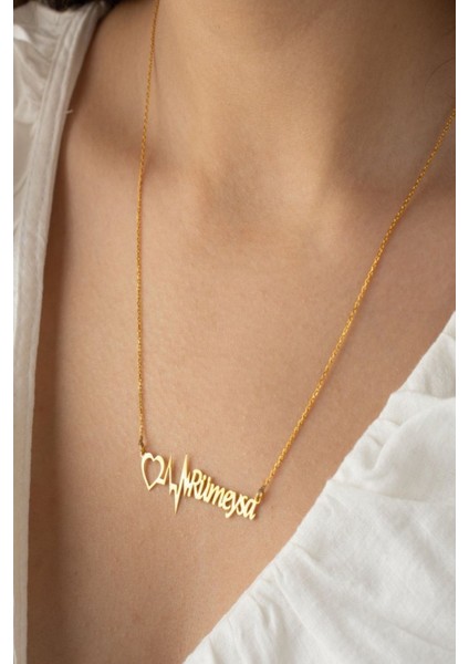 925 Ayar Gümüş Isimli Kalp Ritim Kolyesi fırsatları