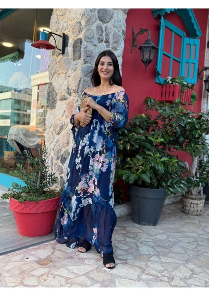 Çiçek Desenli Mavi Ipek Elbise – Şık ve Zarif Tasarım