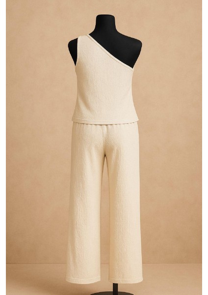 Kadın Beyaz Tek Omuzlu Şık Bluz & Geniş Paça Pantolon Ikili Takım indirimleri