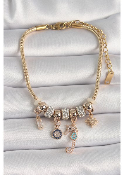 Pirinç Gold Renk Zincir Sallantı Zirkon Taşlı Deniz Atı Figür Nazar Boncuk Detay Kadın Bileklik