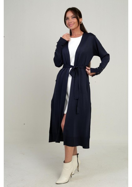 Kadın Kolları Düğme Detaylı Cepli Yanları Yırtmaaçlı Uzun Hırka modelleri