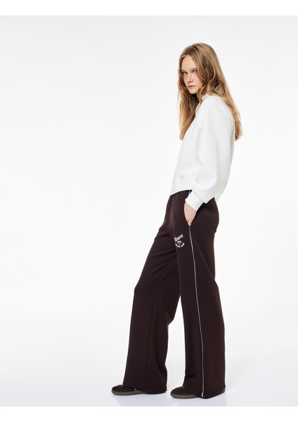 Pamuklu Şardonlu Biyeli Baskılı Beli Lastikli Geniş Paça Eşofman Altı fiyatları