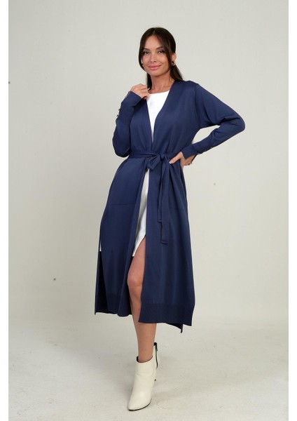 Kadın Kolları Düğme Detaylı Cepli Yanları Yırtmaaçlı Uzun Hırka modelleri