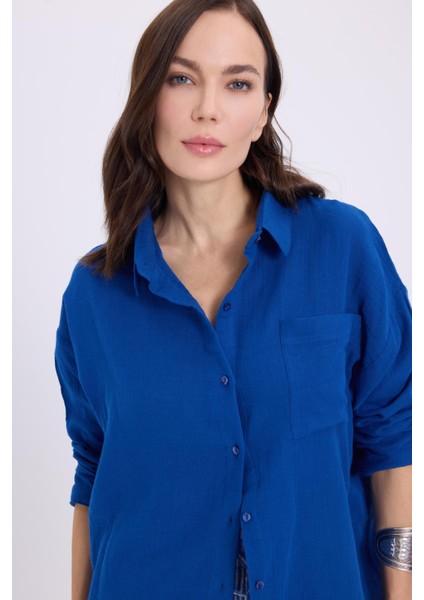 Kadın Oversize Geniş Kesim %100 Pamuk Müslin Kumaş Uzun Kollu Cepli Dokulu Saks Mavi Gömlek