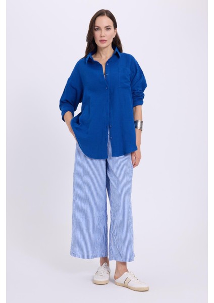 Kadın Oversize Geniş Kesim %100 Pamuk Müslin Kumaş Uzun Kollu Cepli Dokulu Saks Mavi Gömlek fırsatları