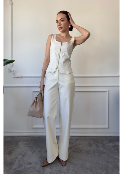 Arkası Lastikli Boru Paça Pantolon- Krem indirimleri
