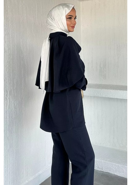 Pelerinli Broş Detaylı Kuşaklı Tunik Bel Lastikli Pantolon Tesettür Ikili Takım P-00018879 fırsatları