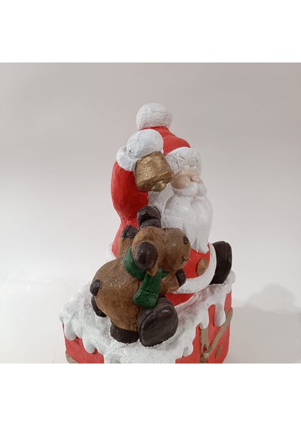 Hediye Paketi Üzerine Oturan Noel Baba Büyük fırsatları