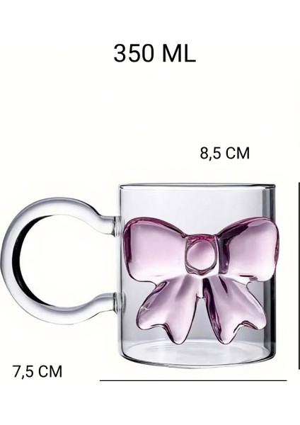Pembe Fiyonklu Kulplu Cam Bardak, 350 ml Hacimli Borosilikat Cam Yapısı, Ergonomik Kulbu ve Dekoratif Fiyonk Tasarımıyla Çay, Kahve ve Sıcak Içecek Sunumlarınızda Zarafet Katar. fiyatları