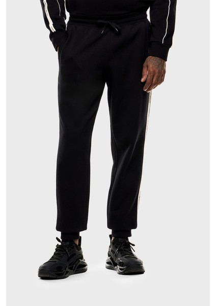 Pamuklu Regular Fit Lastikli Paça Logolu Şerit Detaylı Jogger Pantolon Erkek Pantolon 7M000974 AF10377 UC001