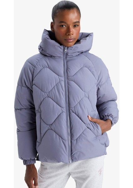 Fit Su İtici Oversize Fit Geniş Kalıp Kapüşonlu Fermuarlı Cepli Şişme Mont E9260AX25AU fırsatları