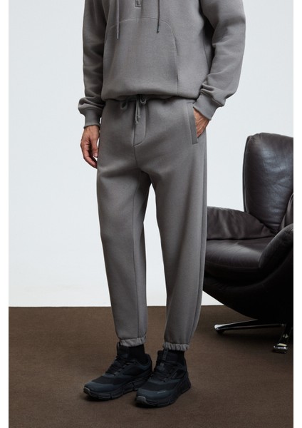 ANSEL Erkek Lastikli Dar Paça Üç Cepli Yumuşacık Organik Pamuklu Koyu Gri Eşofman Altı fırsatları