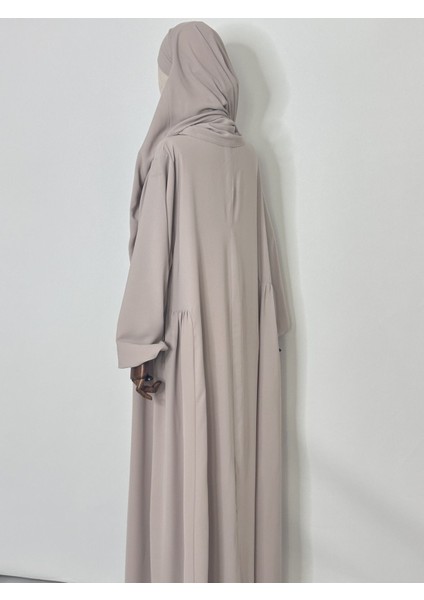 Yandan Robalı,tesettür Bol Elbise,hac ve Umre Için Uygundur Medine Ipegi Kumas Tas Rengi fiyatları