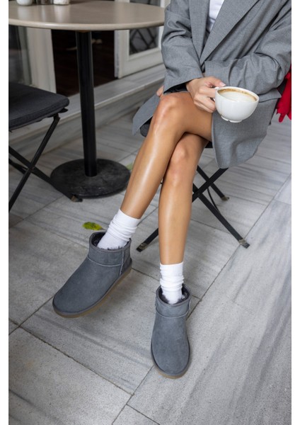 Messiy Kadın Ultra Mini Sahra Gercek Suet Yogun Kurk Bot fiyatları