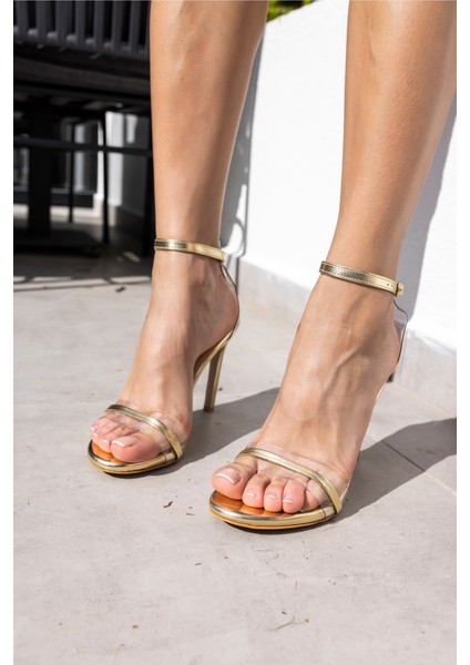 Aryan Kadin Gumus Seffaf Tek Bant Topuklu Ayakkabi fiyatları