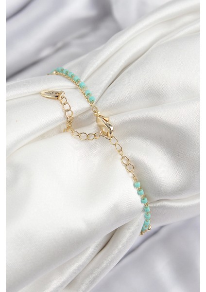 Bfs Pirinç Zirkon Taşlı Mavi Boncuklu Model Gold Renk Kadın Bileklik fiyatları