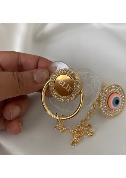 Altın Kaplama Isimli Zirkon Taşlı Silikon Emzik Seti (0-6 Ay) – Damaklı & Kişiye Özel Şeffaf fiyatları