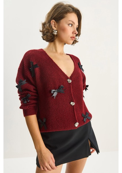 Kadın Fiyonk Aksesuarlı V Yaka Oversize Düğmeli Hırka fiyatları