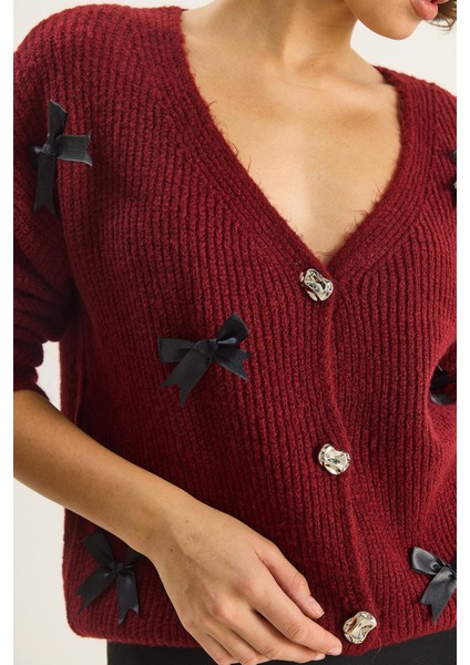 Kadın Fiyonk Aksesuarlı V Yaka Oversize Düğmeli Hırka indirimleri