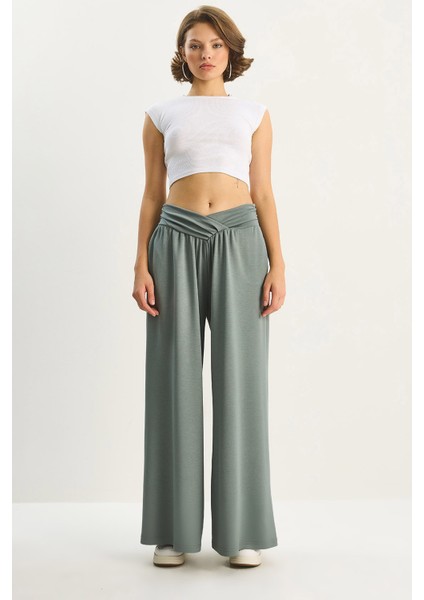 Kadın Asimetrik Bel Detaylı Cepli Rahat Modal Pantolon fırsatları
