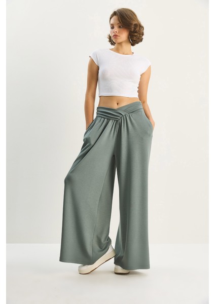 Kadın Asimetrik Bel Detaylı Cepli Rahat Modal Pantolon indirimleri