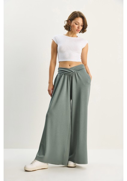 Kadın Asimetrik Bel Detaylı Cepli Rahat Modal Pantolon modelleri