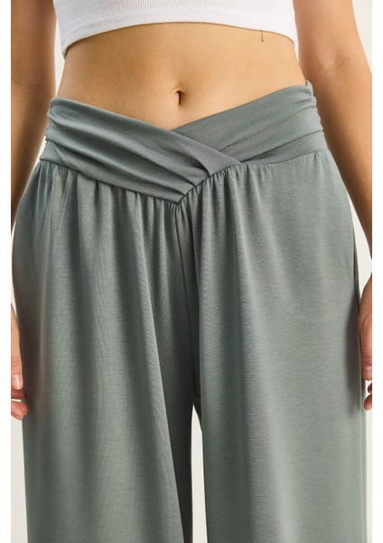 Kadın Asimetrik Bel Detaylı Cepli Rahat Modal Pantolon