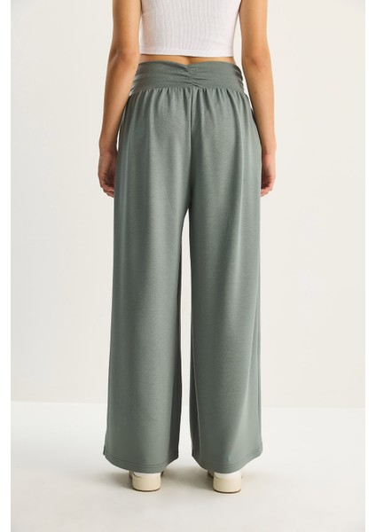 Kadın Asimetrik Bel Detaylı Cepli Rahat Modal Pantolon