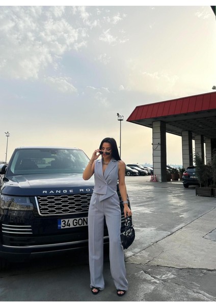 Kadın Çizgili Asimetrik Kesim Yelek Palazzo Pantolon Takım Elbise modelleri