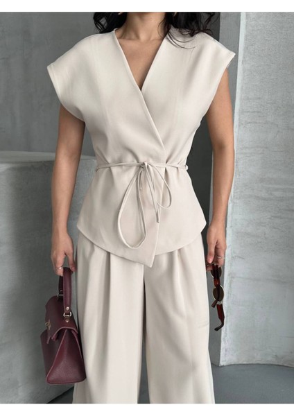 Kadın Kuşaklı Yelekli Palazzo Pantolonlu Takım Elbise indirimleri