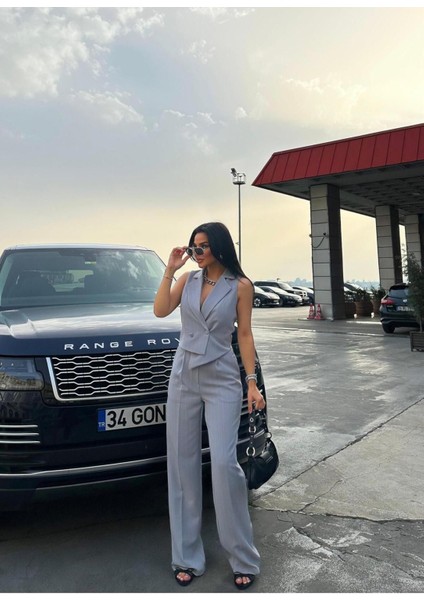 Kadın Çizgili Asimetrik Kesim Yelek Palazzo Pantolon Takım Elbise fırsatları