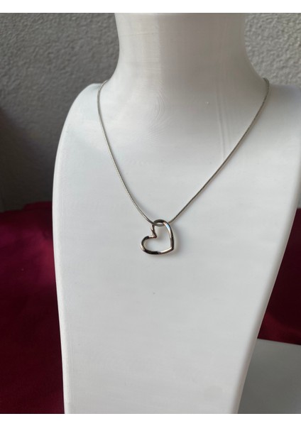 Kararmaz Çelik Sarkan Kalp Detaylı Gümüş Kolye modelleri
