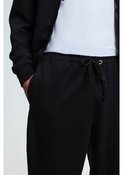 GRIFFIN Erkek Kordonlu Beli Lastikli Metal Kuş Gözü Detaylı Siyah Eşofman Altı fırsatları