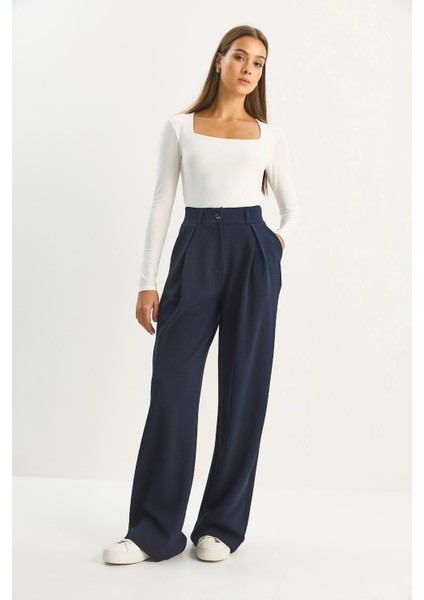 Kadın Yüksek Bel Dökümlü Cep Detaylı Piliseli Pantolon fiyatları