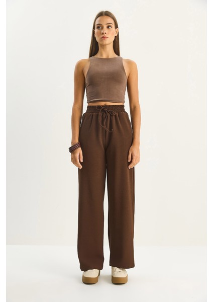 Kadın Yüksek Bel Lastikli Bağcıklı Dökümlü Bol Paça Pantolon modelleri