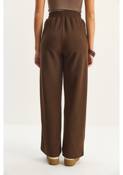 Kadın Yüksek Bel Lastikli Bağcıklı Dökümlü Bol Paça Pantolon