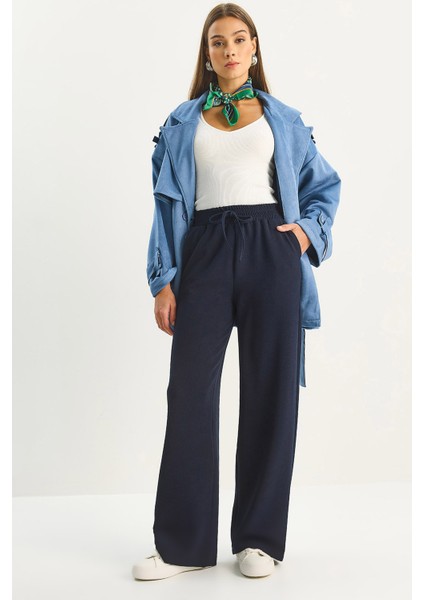 Kadın Yüksek Bel Lastikli Bağcıklı Dökümlü Bol Paça Pantolon