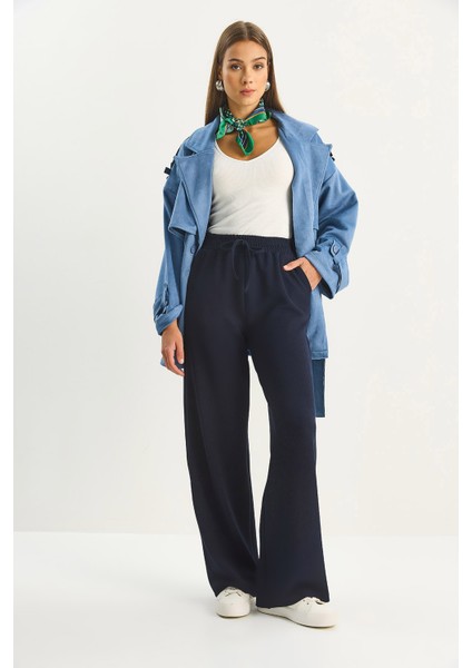 Kadın Yüksek Bel Lastikli Bağcıklı Dökümlü Bol Paça Pantolon indirimleri