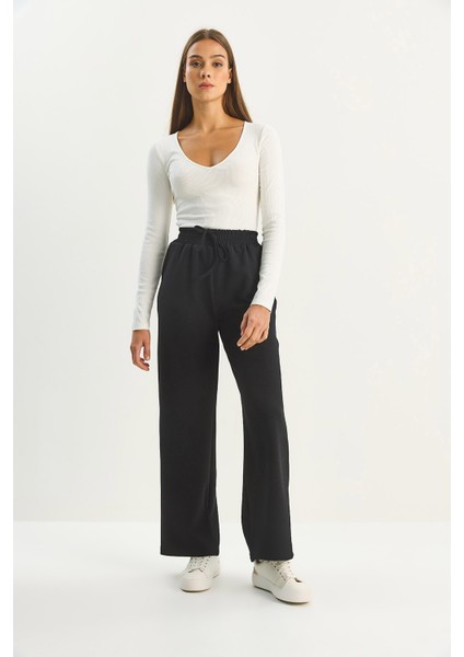Kadın Yüksek Bel Lastikli Bağcıklı Dökümlü Bol Paça Pantolon fırsatları
