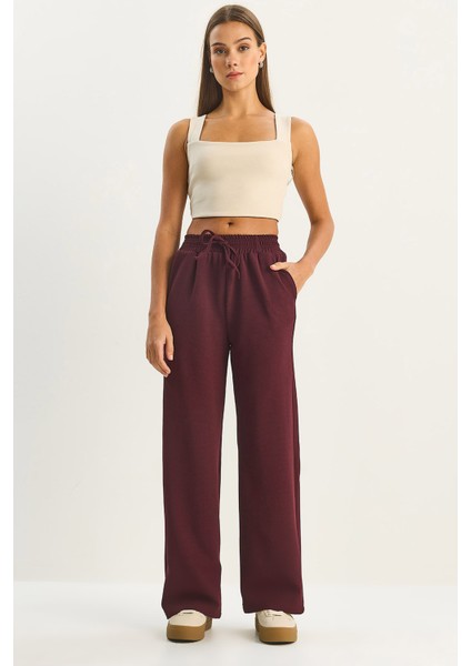 Kadın Yüksek Bel Lastikli Bağcıklı Dökümlü Bol Paça Pantolon